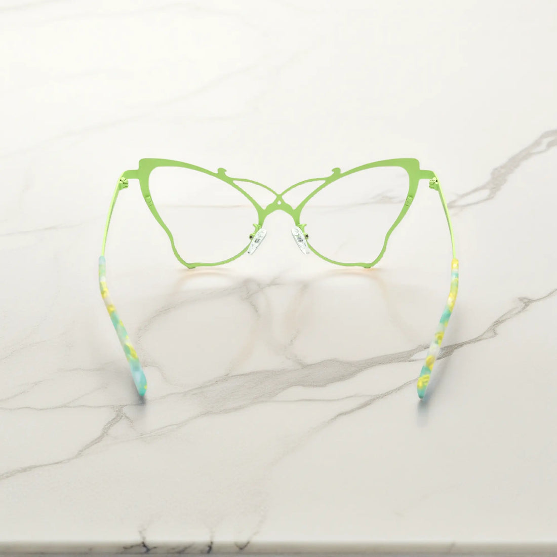 Back of VoyueLens™ VL185862 titanium butterfly eyeglasses in Blue Green – a lightweight, colorful, vintage-inspired, prescription ready frame designed for unique artistic style and everyday comfort.