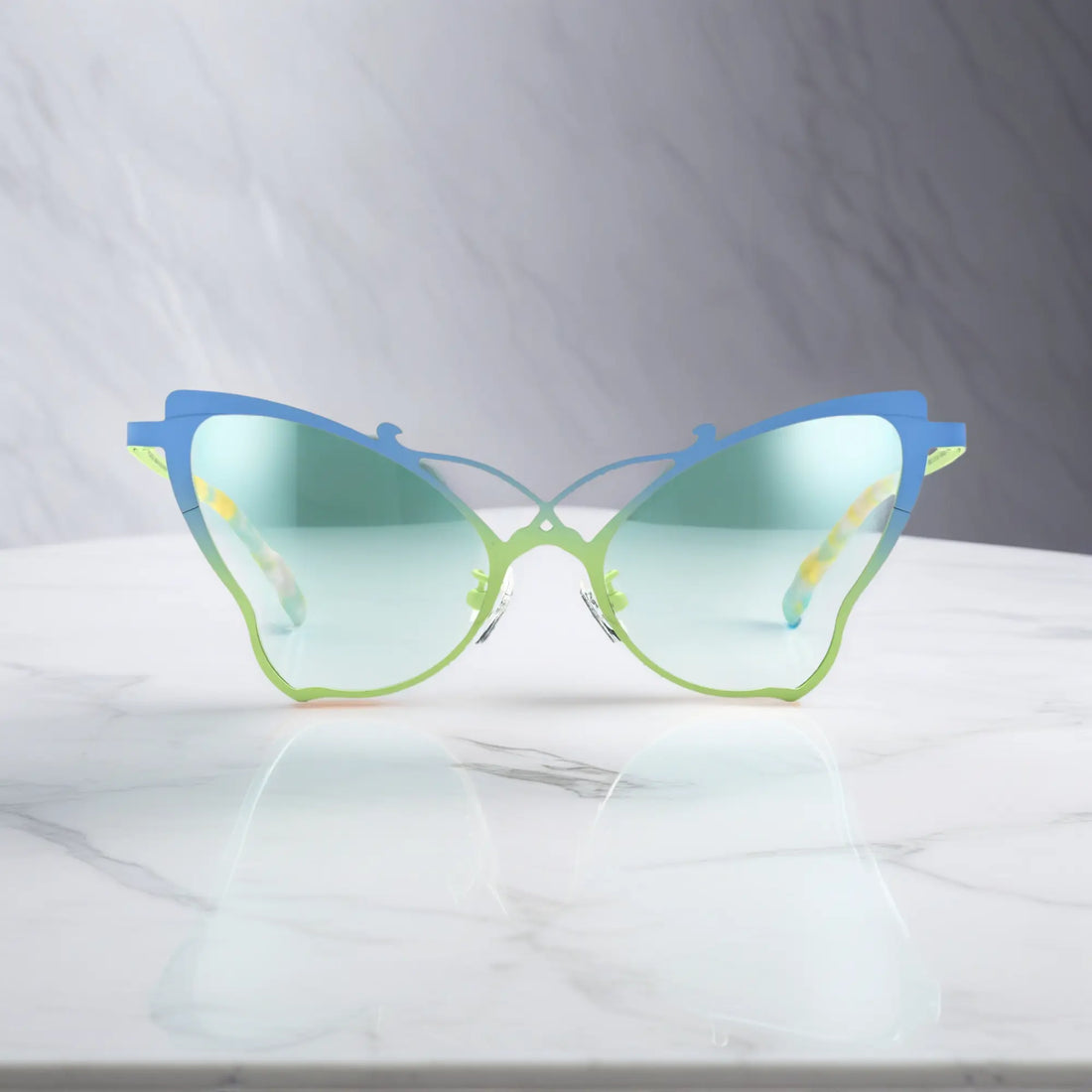 Front of VoyueLens™ VL185862 titanium butterfly eyeglasses in Blue Green – a lightweight, colorful, vintage-inspired, prescription ready frame designed for unique artistic style and everyday comfort.