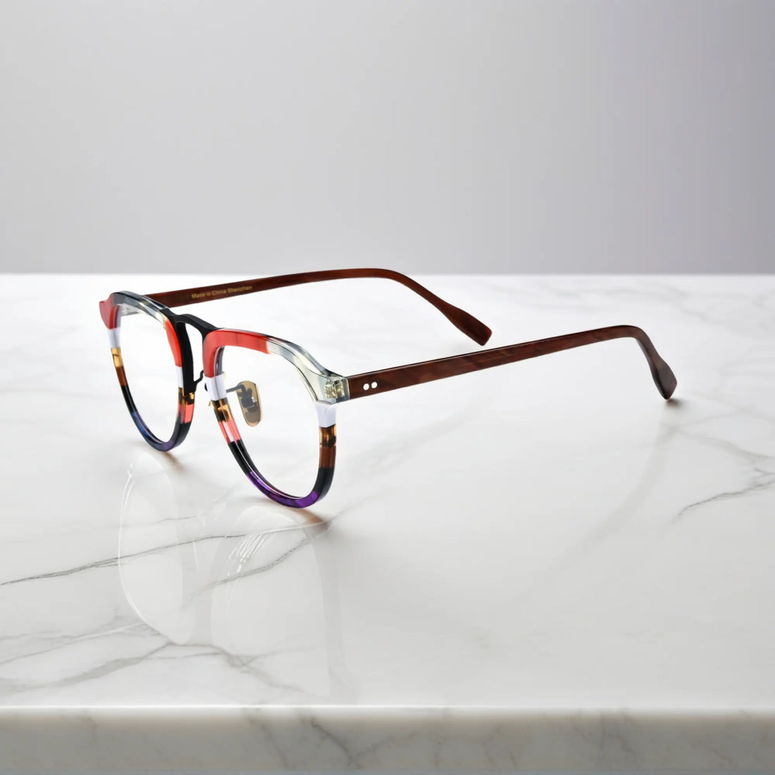 Side profile of VoyueLens Crimson Fade on Walnut red grey acetate aviator eyeglasses