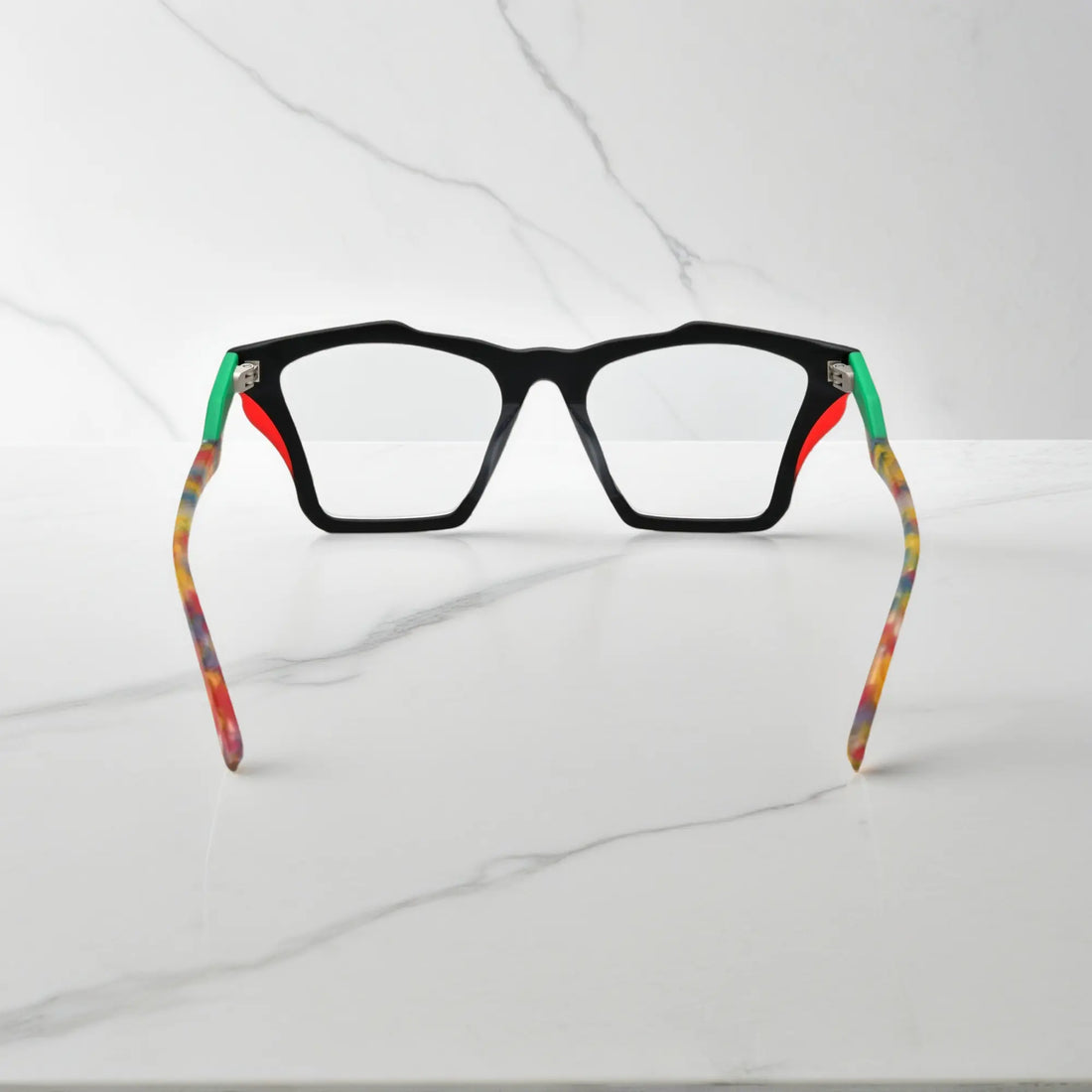 Rear view of VoyueLens™ Crystal Confetti frame, displaying translucent frosted acetate with pastel speckles from the inner frame and hinge area.