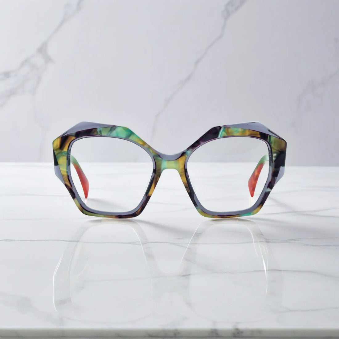 Front view of VoyueLens™ Forest Marble eyeglasses featuring a polygonal frame and rich green-acetate color blend.