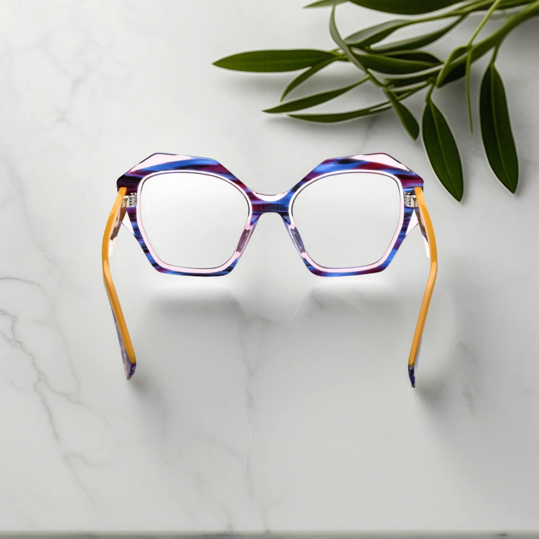 Back view featuring the rich amber color blend and geometric eyewear shape.