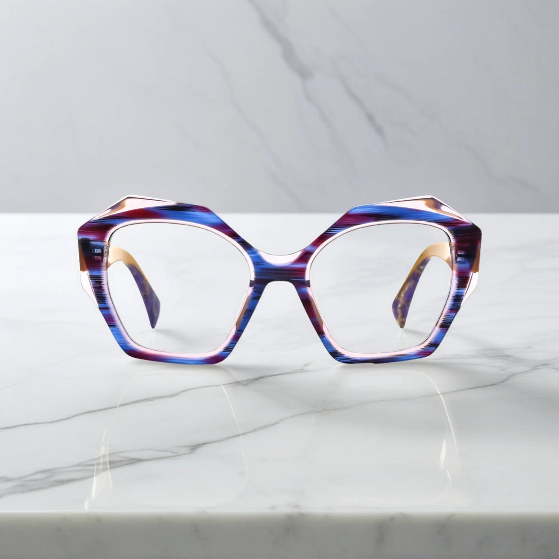 Warm front angle of VoyueLens™ Honey Amber eyeglasses with amber-yellow arms and colorful frame.