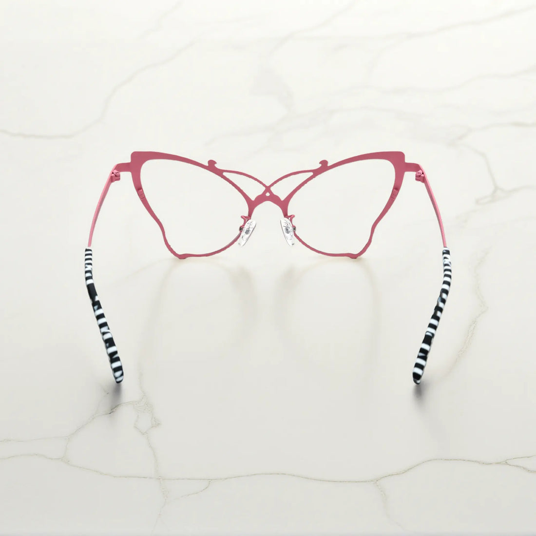 Back of VoyueLens™ VL185862 titanium butterfly eyeglasses in Pink Black – a lightweight, colorful, vintage-inspired, prescription ready frame designed for unique artistic style and everyday comfort.