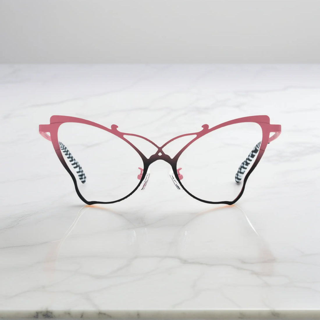 Front of VoyueLens™ VL185862 titanium butterfly eyeglasses in Pink Black – a lightweight, colorful, vintage-inspired, prescription ready frame designed for unique artistic style and everyday comfort.