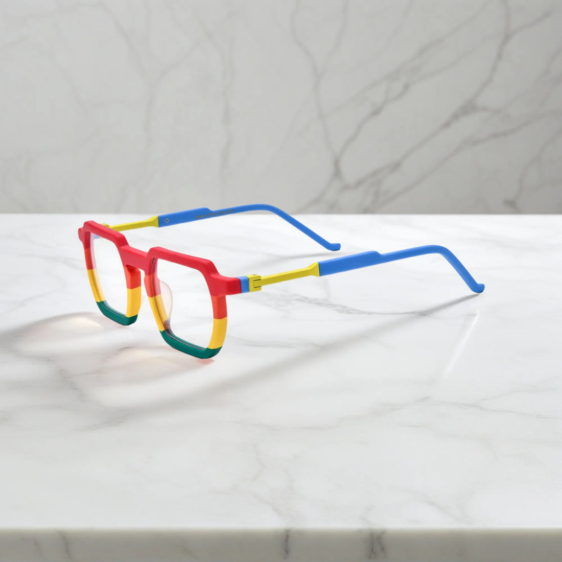 Side angle of VoyueLens™ Rainbow Rush statement frames with multi-color gradient detailing and sculpted acetate arms in tortoiseshell