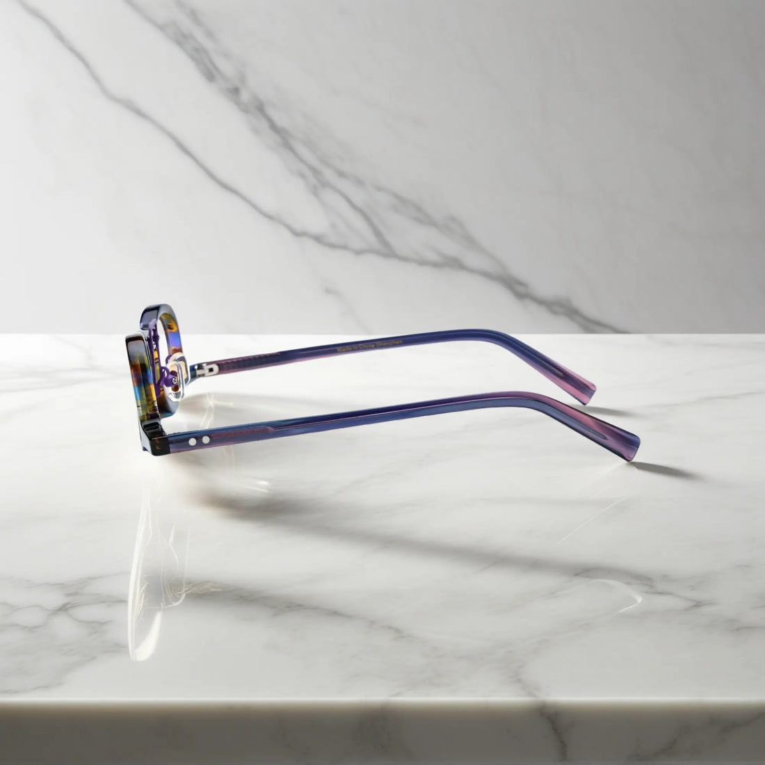 Side profile of VoyueLens™ Rainbow Tortoise geometric eyeglass frames showing temples and nose pads