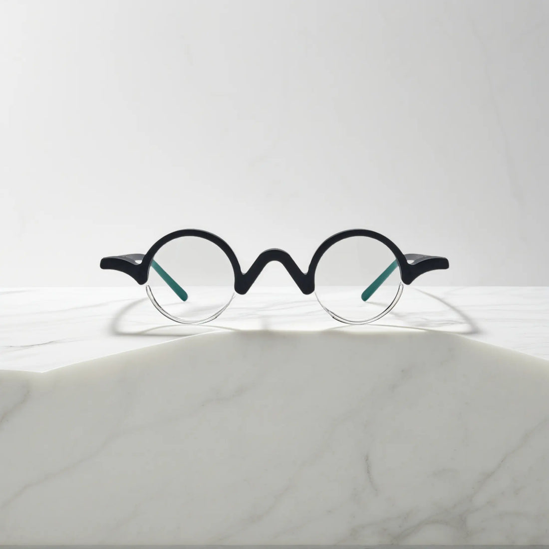 Front facing image of VoyueLens™ Solid Black semi-rimless browline eyeglasses with minimalistic matte black design.