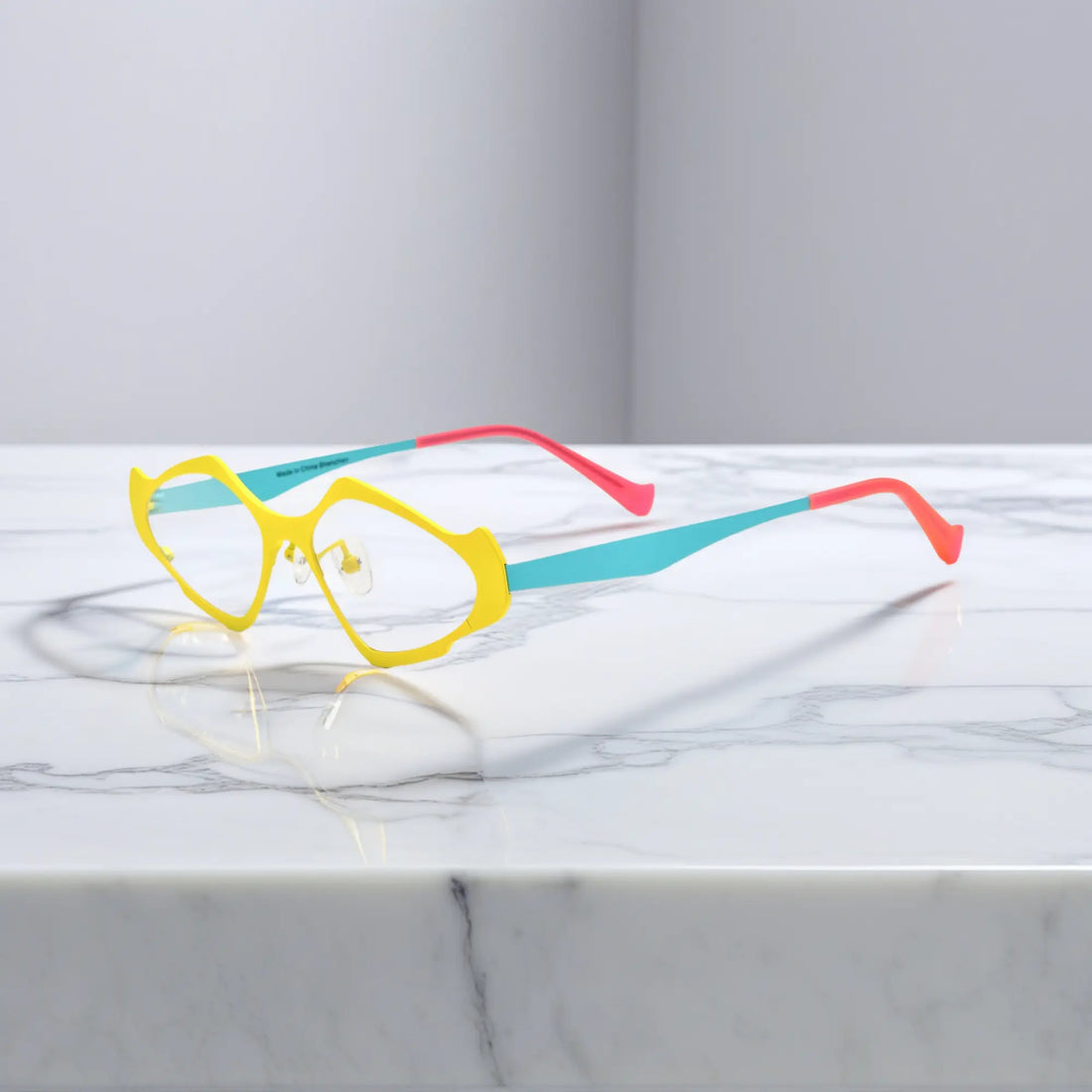 Side profile of VoyueLens™ VL185811 Sunshine Teal titanium geometric eyeglasses