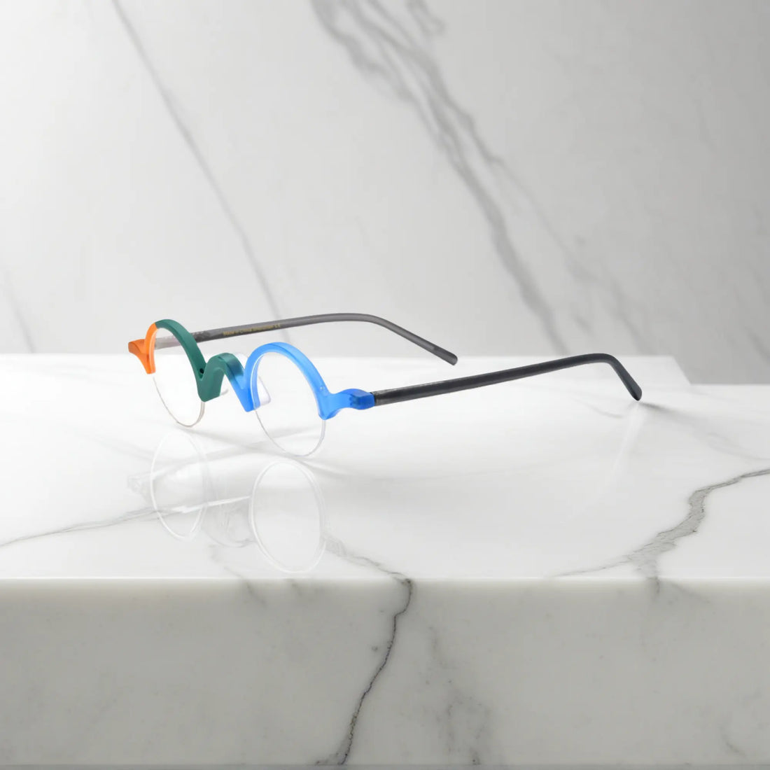 Side profile of VoyueLens™ Teal-Blue semi-rimless browline eyeglasses crafted with matte acetate.