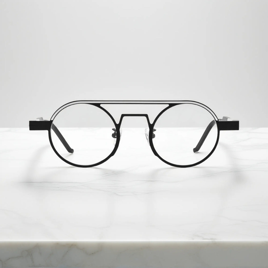 Front view of VoyueLens™ NeoPilot aviator glasses in Graphite Black matte titanium frame for a modern minimalistic look