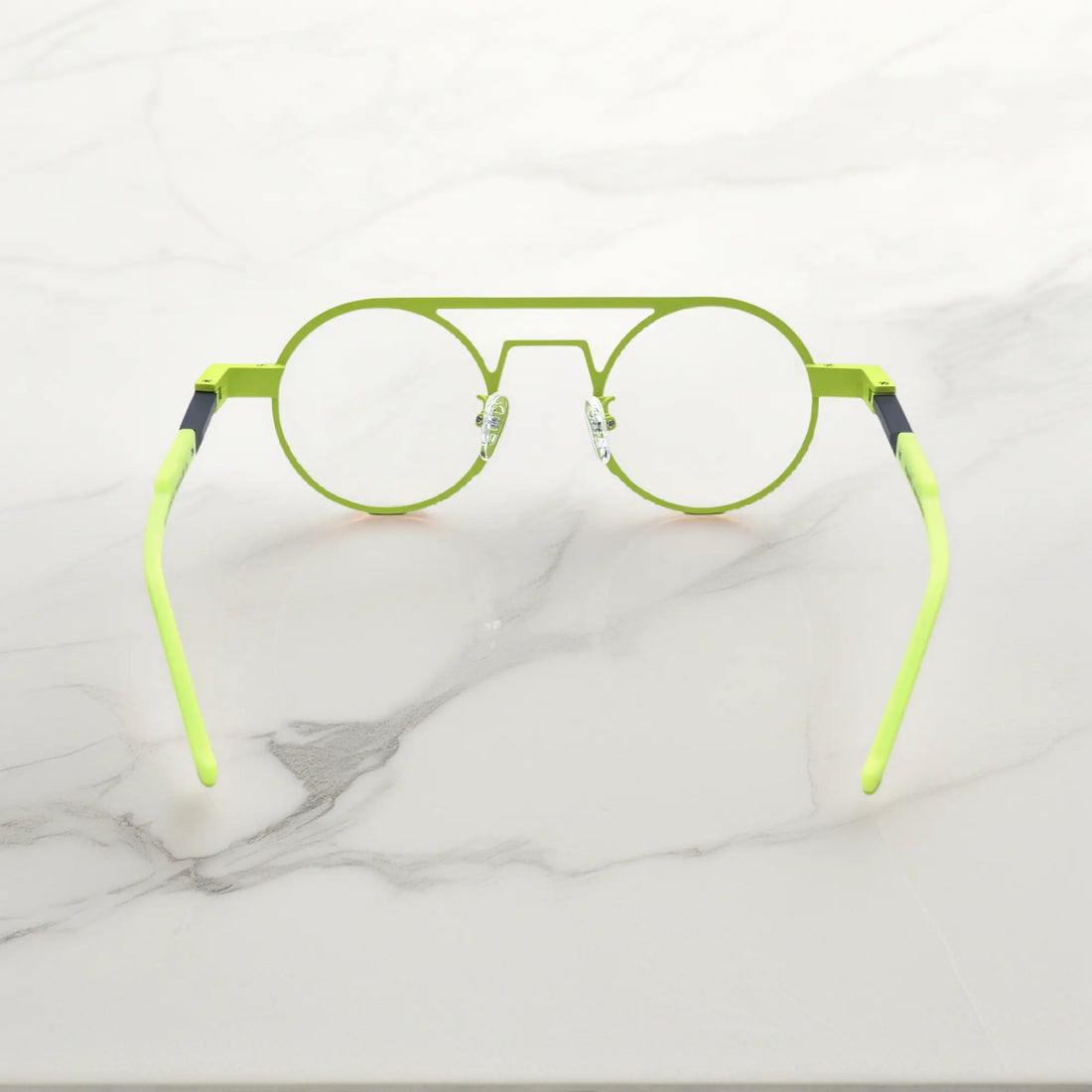 Rear angle displaying the ergonomic nose pads and lightweight design in Neon Moss bold green colorway for statement-making eyewear