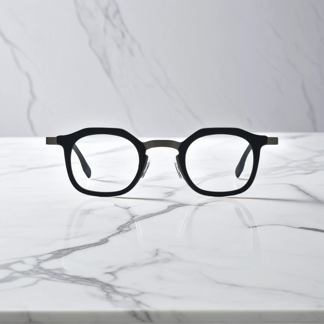 Front view of VoyueLens™ Graphite Mist square eyeglasses with a matte grey acetate front and black titanium temples.