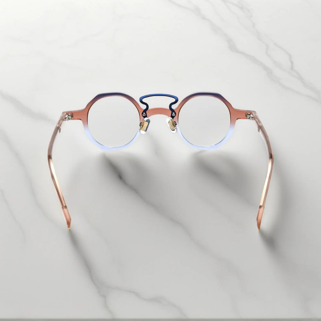 Angled view of VoyueLens™ VL19244 lightweight geometric eyeglasses featuring Mocha Blue Blend acetate frame