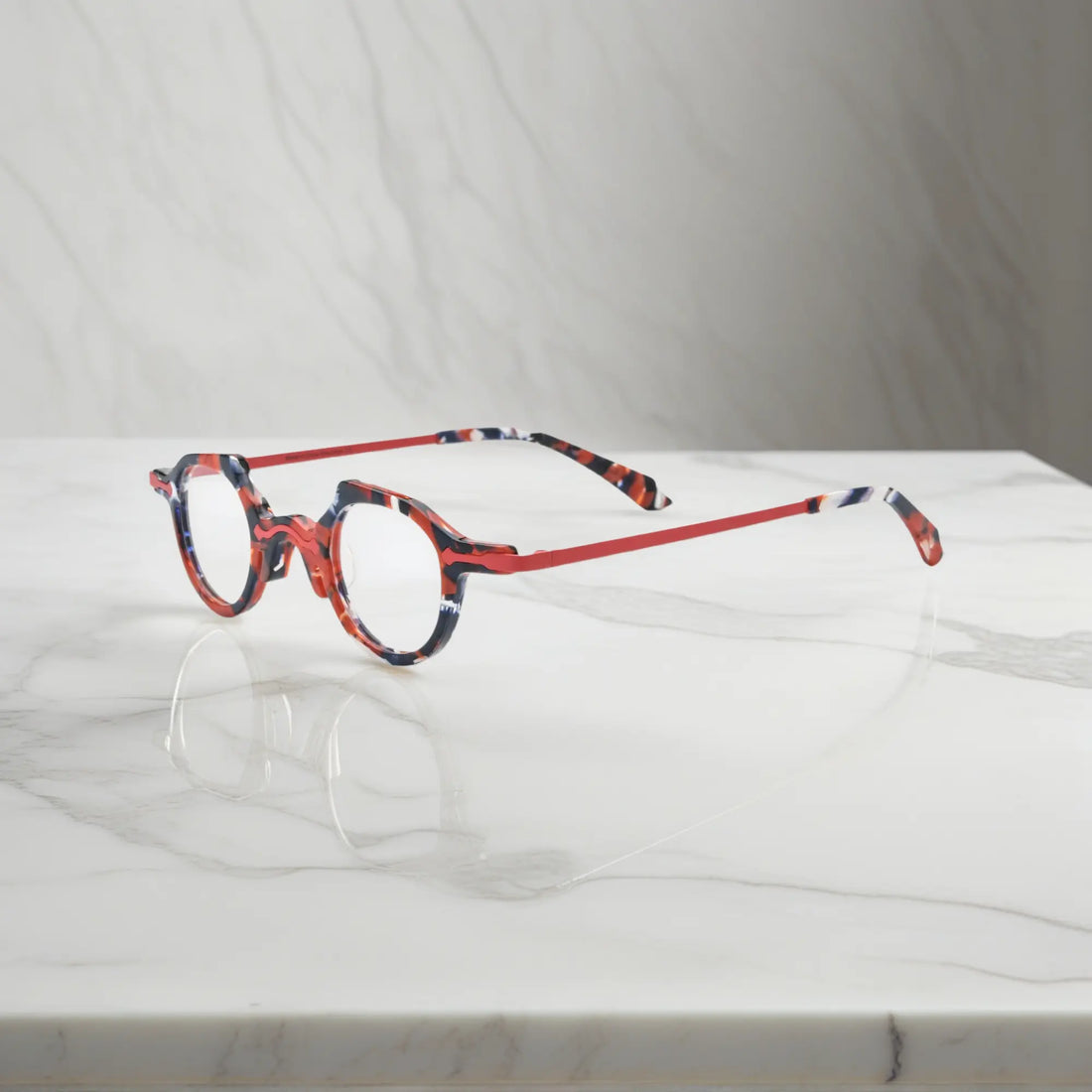 Side profile of the VL19341 ink black and red eyeglasses showing subtle transitions in color and high-quality hinge design.