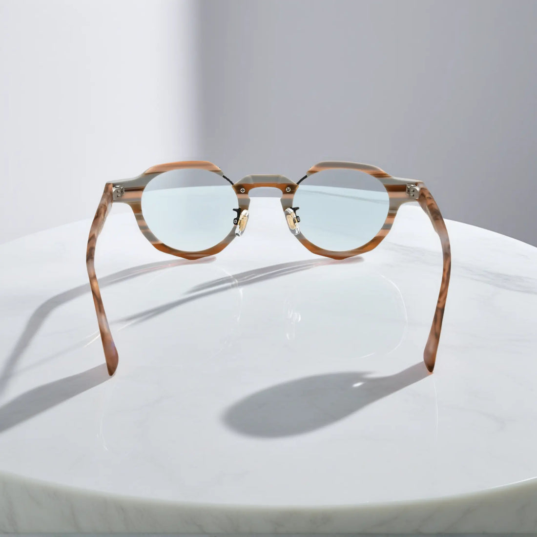 Rear angle of VoyueLens™ Amber Drift eyeglasses highlighting natural-toned acetate