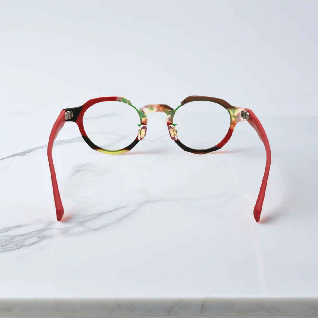 Rear angle of VoyueLens™ Forest Ember eyeglasses highlighting layered acetate tones