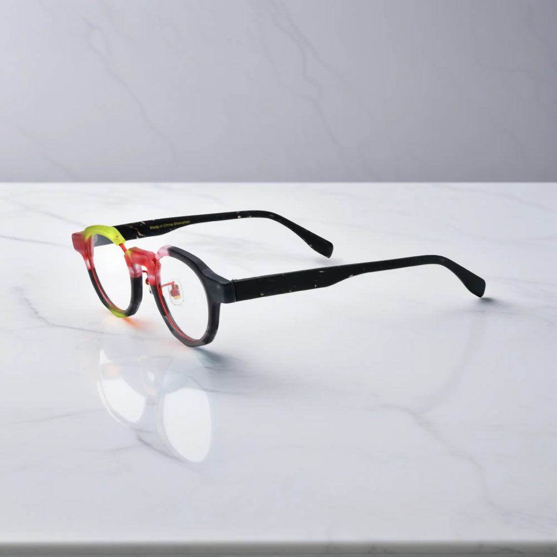 Side view of VoyueLens™ Midnight Flame eyeglasses showing matte black arms and red rims