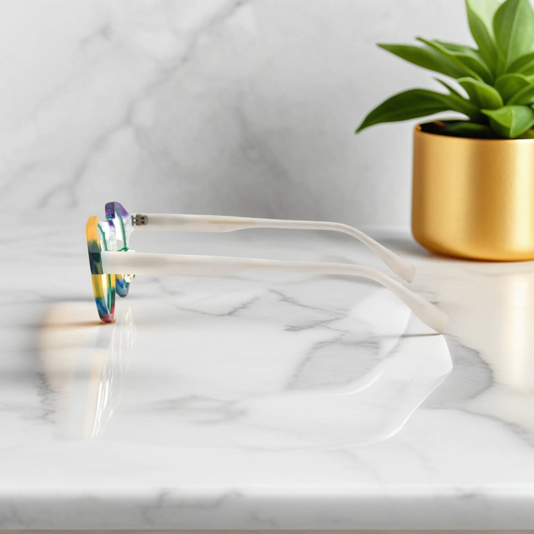 Side profile of VoyueLens™ Rainbow Frost eyeglasses showing matte white temples and colorful rims
