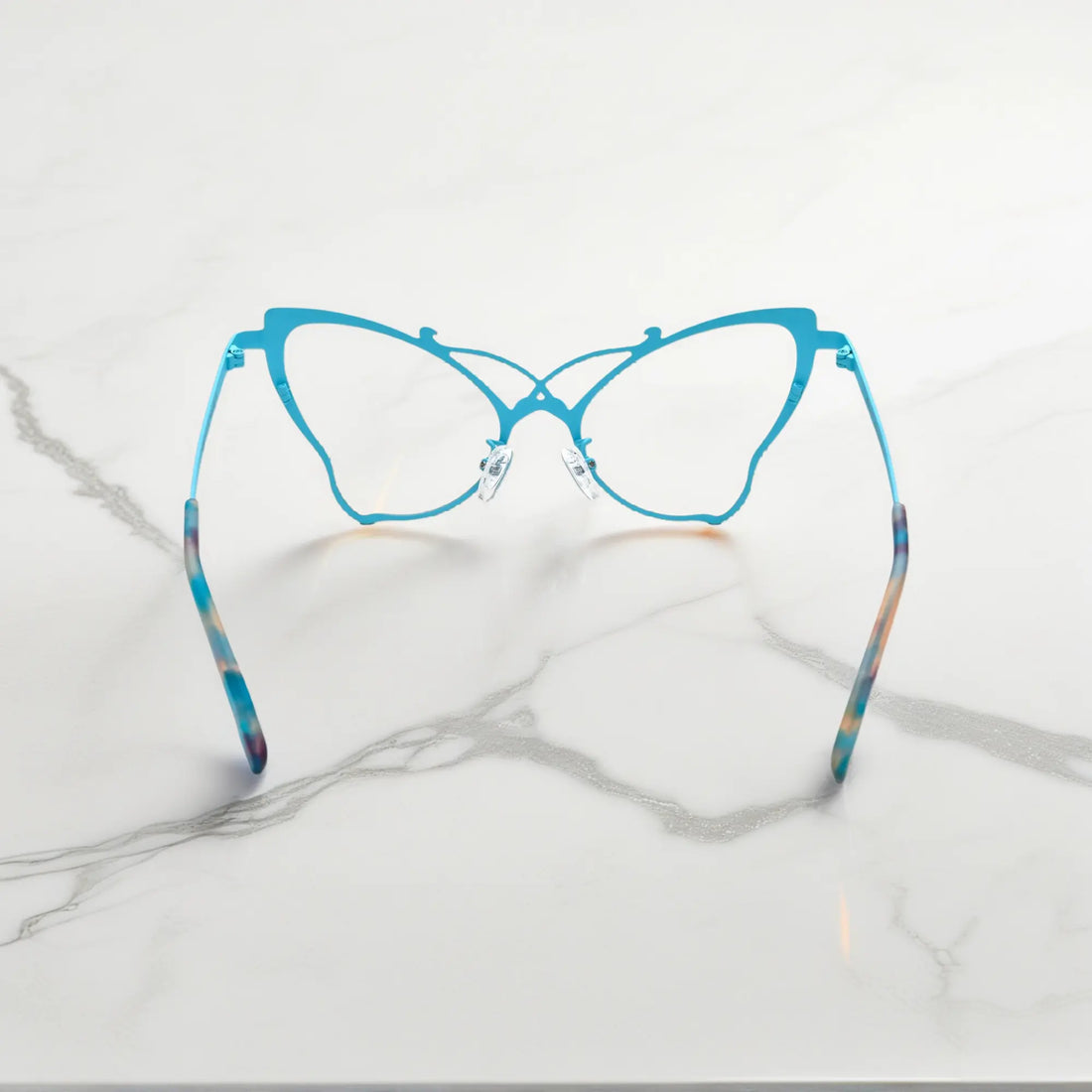 Back of VoyueLens™ VL185862 titanium butterfly eyeglasses in Yellow Blue – a lightweight, colorful, vintage-inspired, prescription ready frame designed for unique artistic style and everyday comfort.