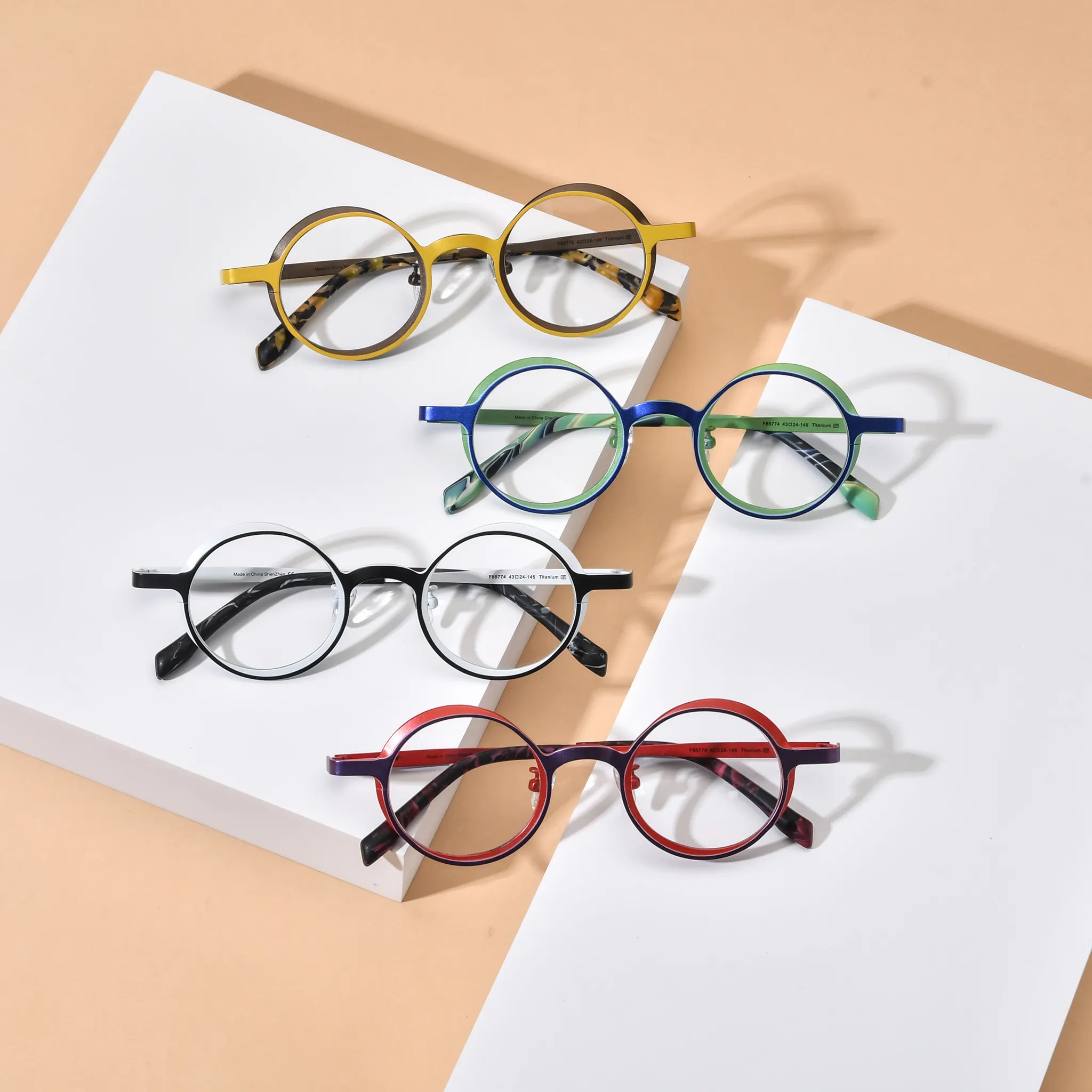 Barledear round pure titanium eyeglasses collection group image showing Golden Walnut Crimson Violet Cobalt Jade and Onyx Crystal color variants