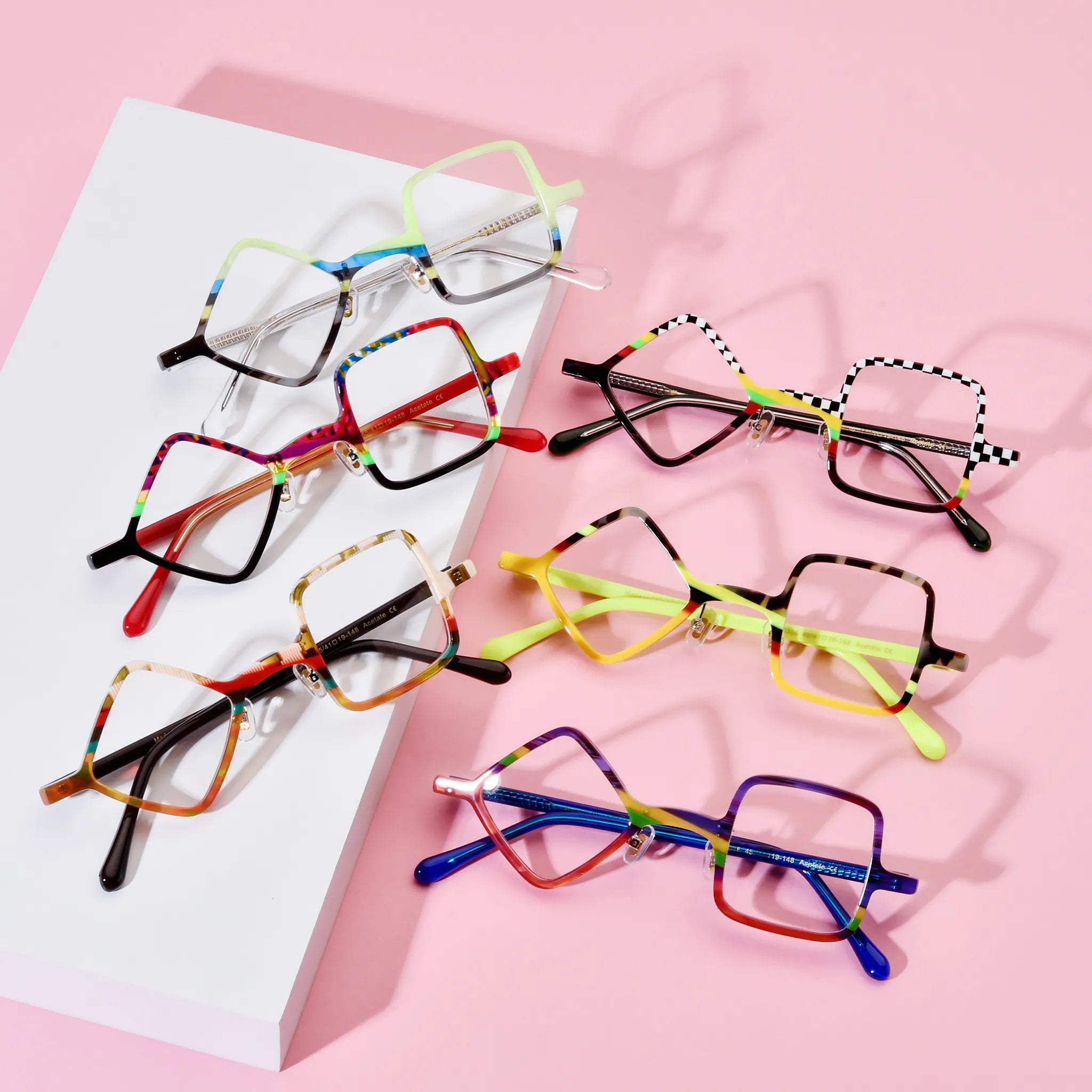 Barledear asymmetric geometric acetate eyeglasses collection showing Checkerboard Spectrum, Lime Smoke, Carnival Noir, Amber Mosaic, Neon Tortoise, and Cobalt Crimson color variants.