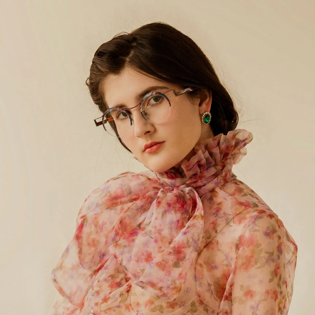 Model wearing Barledear Amber Cocoa eyeglasses in a lifestyle portrait showing warm retro round titanium eyewear style