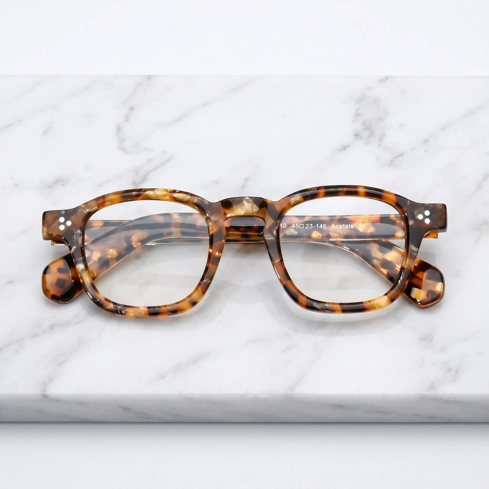 Barledear Amber Leopard Tortoise eyeglasses folded display showing full-rim acetate frame and patterned temple design