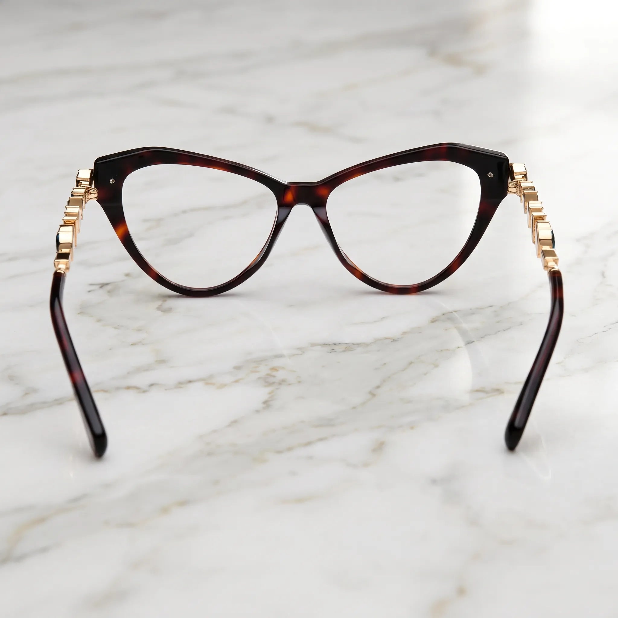 Barledear Amber Tortoise eyeglasses back view showing the full-rim cat-eye structure, molded nose pads, and tortoise acetate temple tips