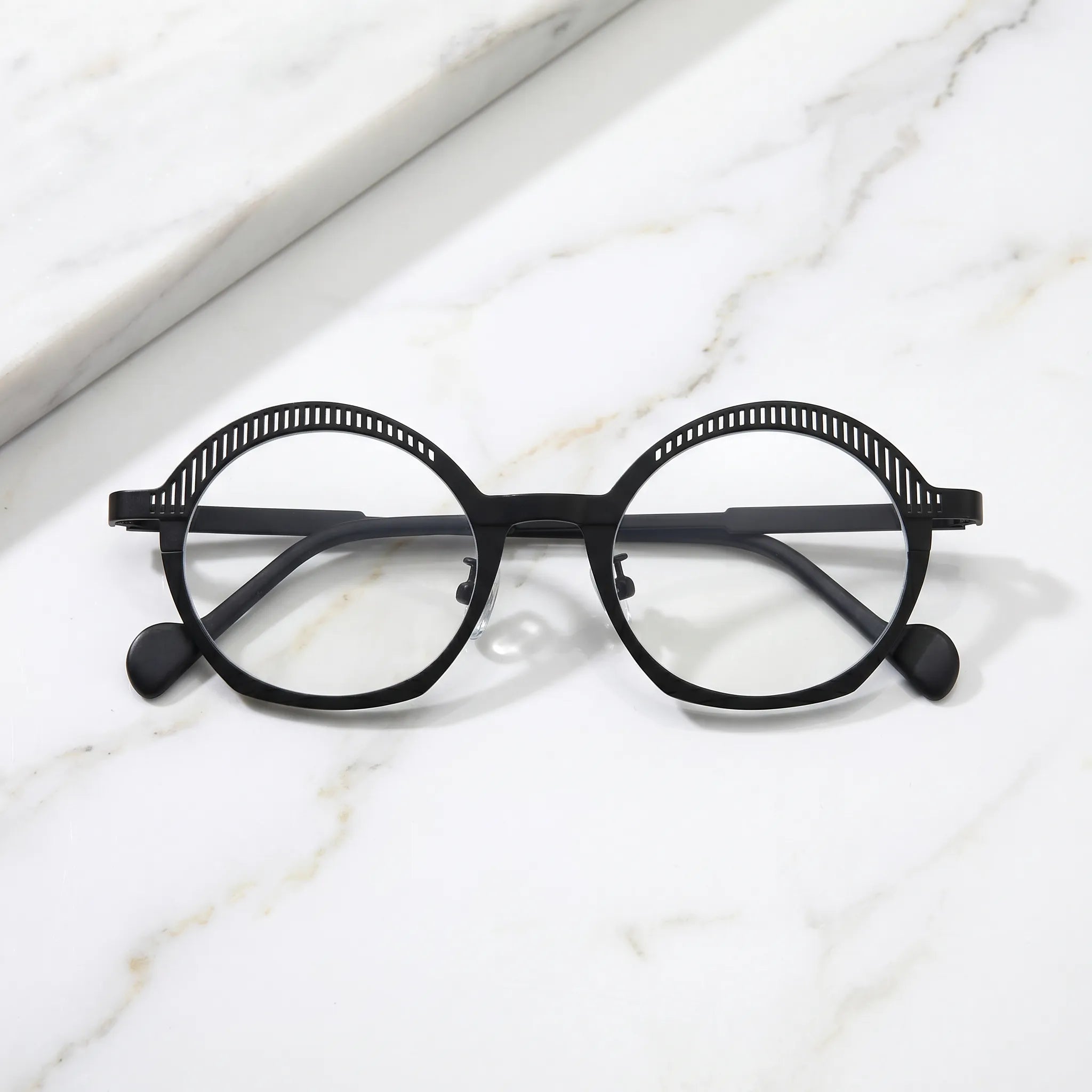 Barledear Charcoal Black eyeglasses folded display showing slim black titanium temples, clear nose pads, and lightweight full-rim design