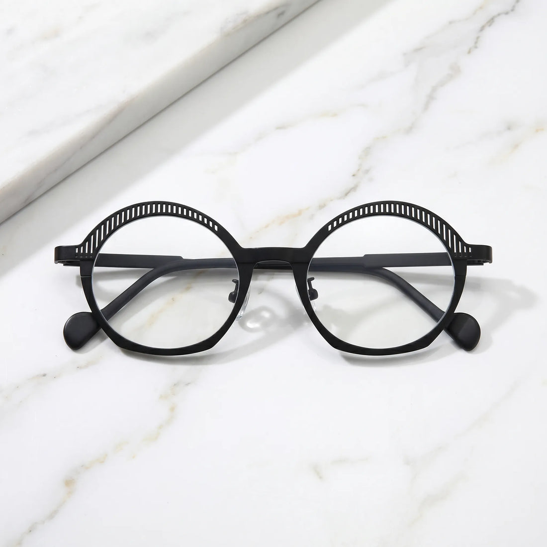 Barledear Charcoal Black eyeglasses folded display showing slim black titanium temples, clear nose pads, and lightweight full-rim design