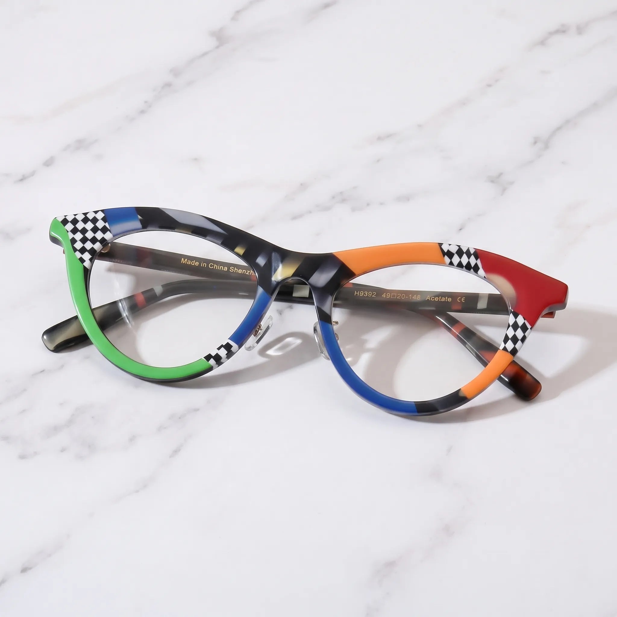 Barledear Checker Clash cat-eye eyeglasses folded display showing the colorful acetate frame and patterned temples
