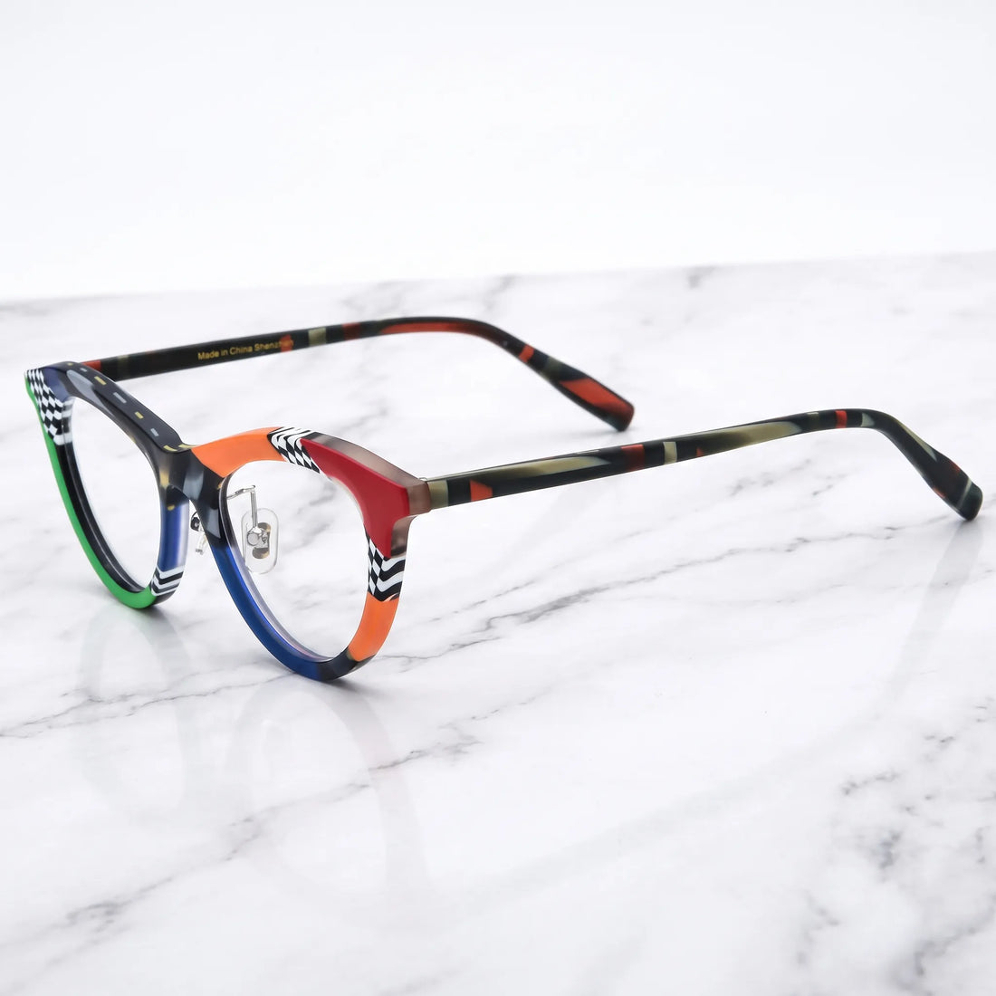 Barledear Checker Clash cat-eye acetate eyeglasses angled side view showing slim patterned temples and adjustable nose pads
