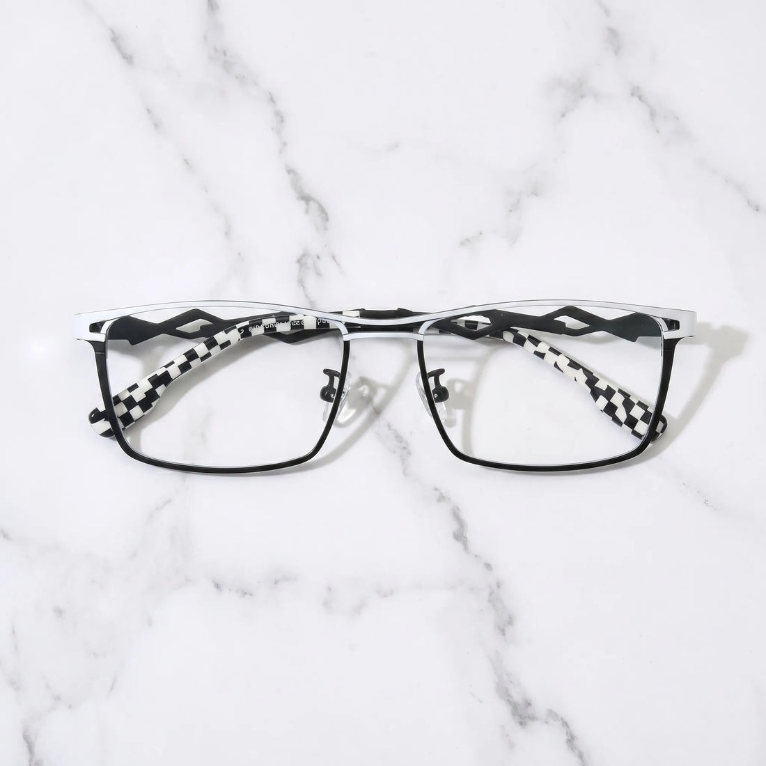 Barledear Checkerboard Ivory Black eyeglasses folded display showing geometric temples and checkerboard temple tips