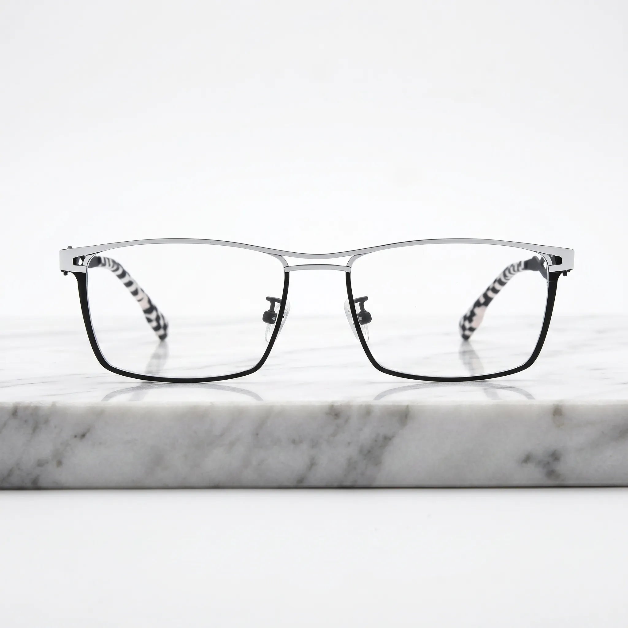 Barledear Checkerboard Ivory Black eyeglasses shown in a clean lifestyle front view with statement temple pattern