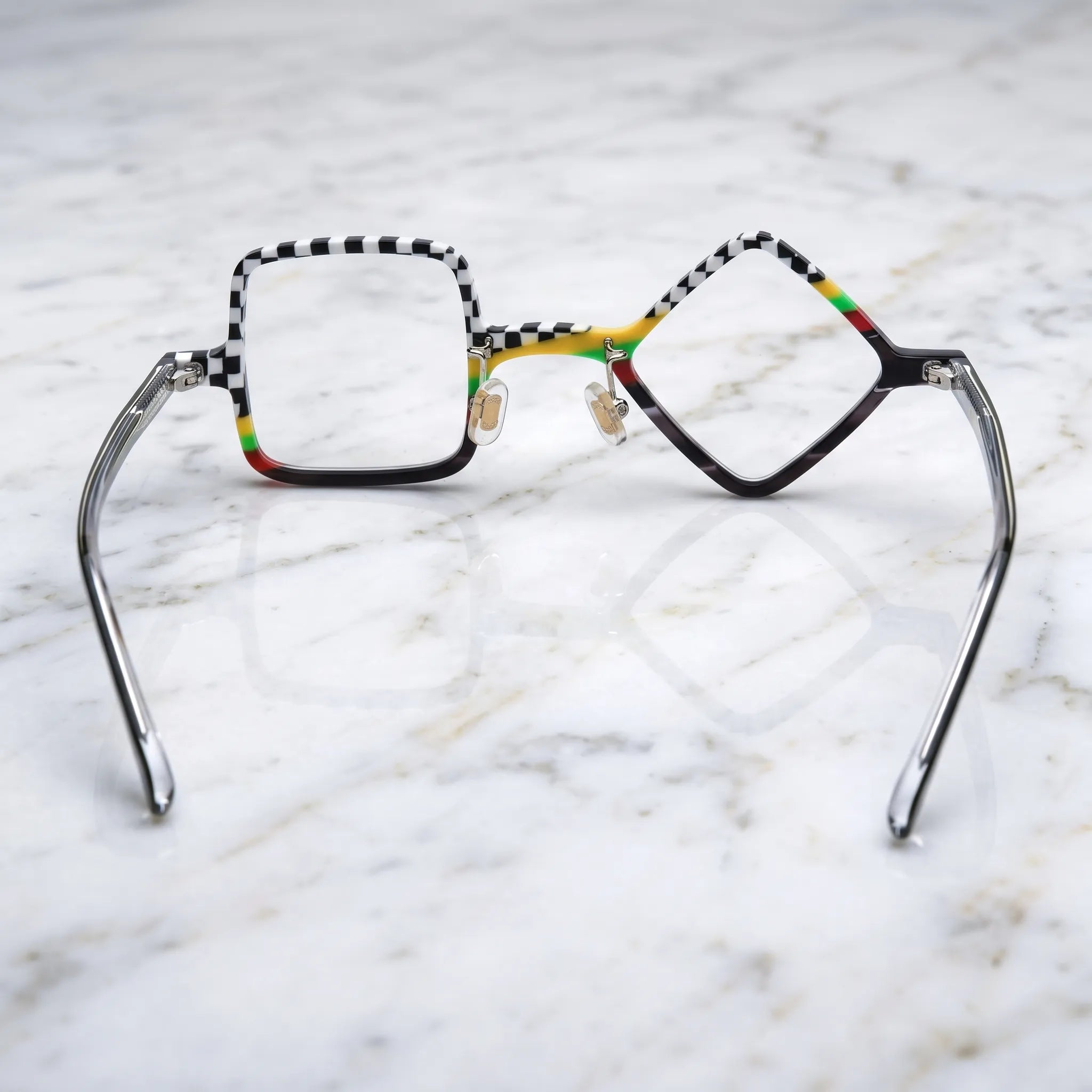 Barledear Checkerboard Spectrum asymmetric geometric acetate eyeglasses back view showing temple shape, adjustable nose pads, and asymmetric frame structure.