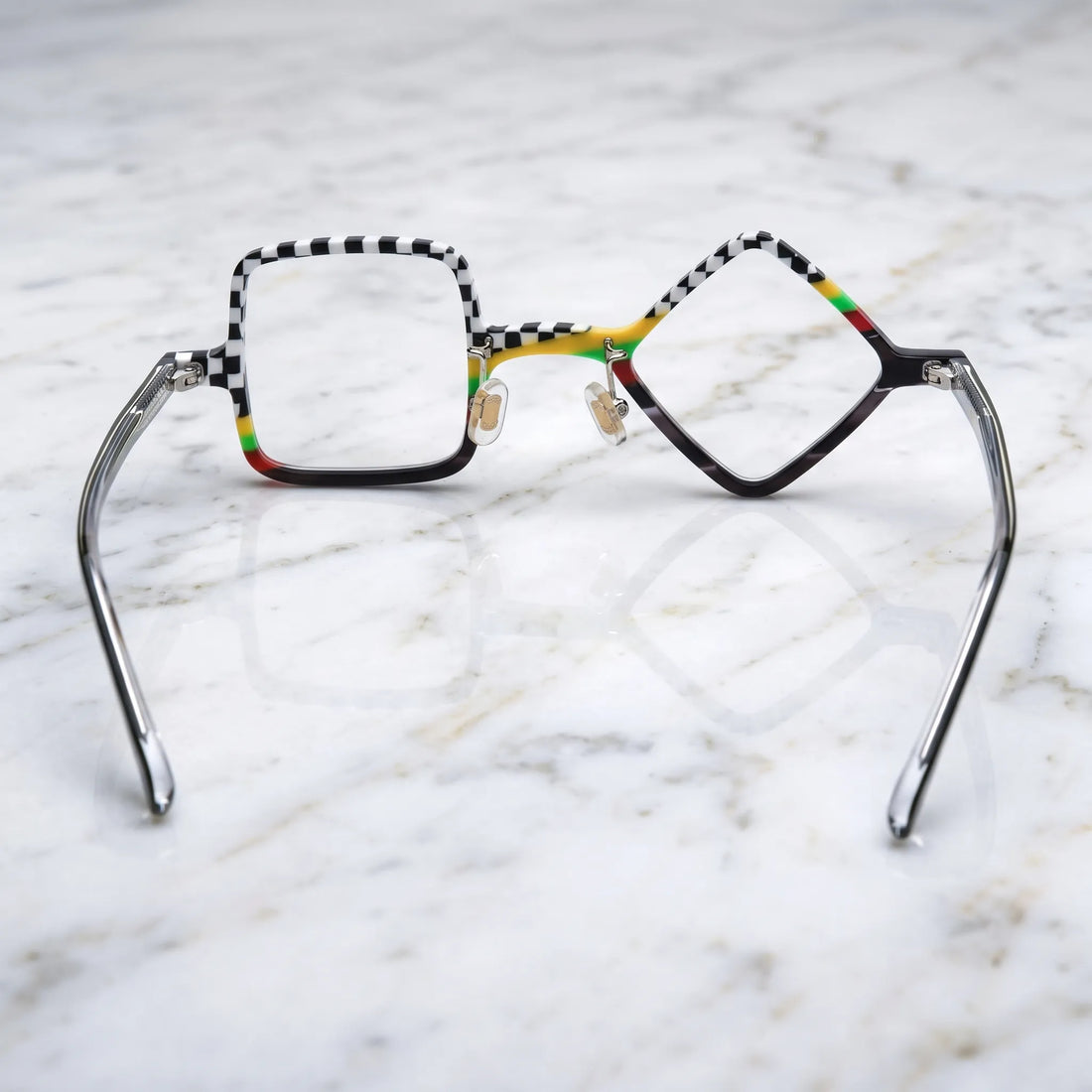 Barledear Checkerboard Spectrum asymmetric geometric acetate eyeglasses back view showing temple shape, adjustable nose pads, and asymmetric frame structure.