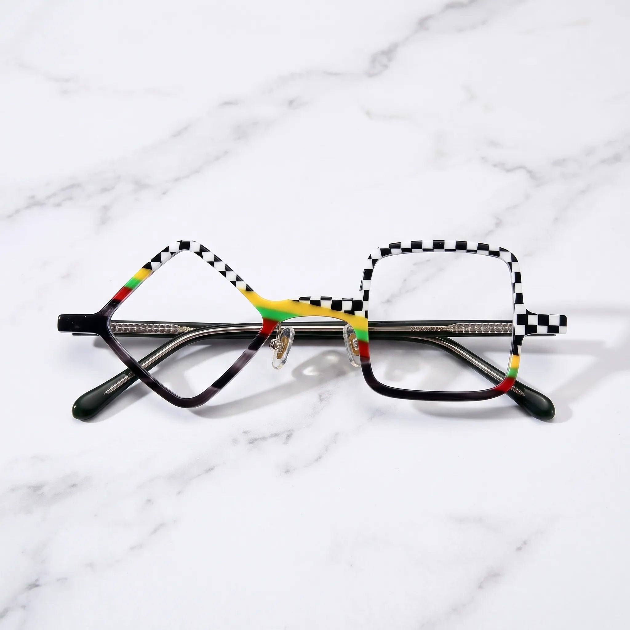 Barledear Checkerboard Spectrum asymmetric geometric acetate eyeglasses folded display showing the full-rim frame, adjustable nose pads, metal hinges, and deep green temples.
