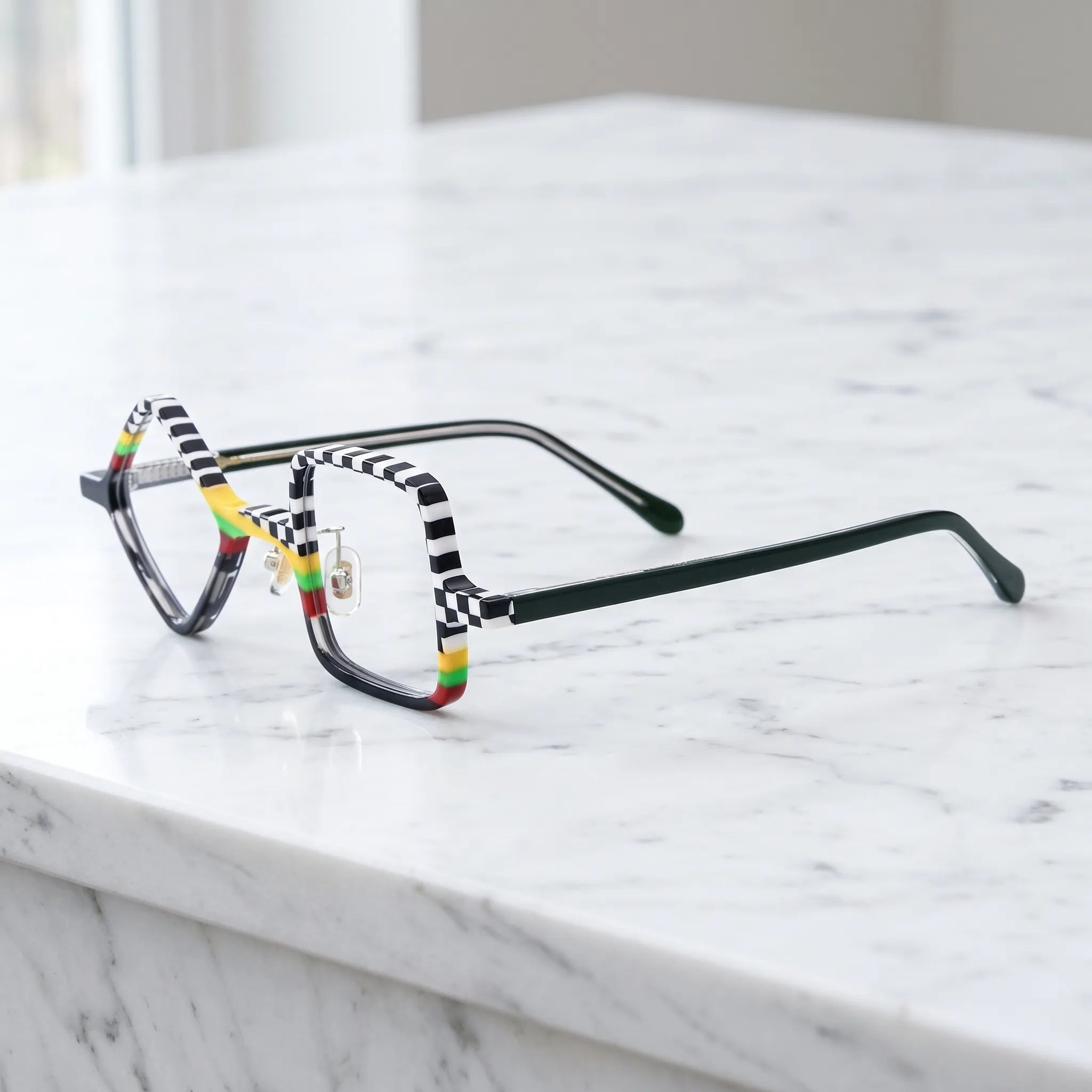 Barledear Checkerboard Spectrum asymmetric geometric acetate eyeglasses angled side view showing the mismatched frame shape, reinforced hinges, and slim deep green temples.