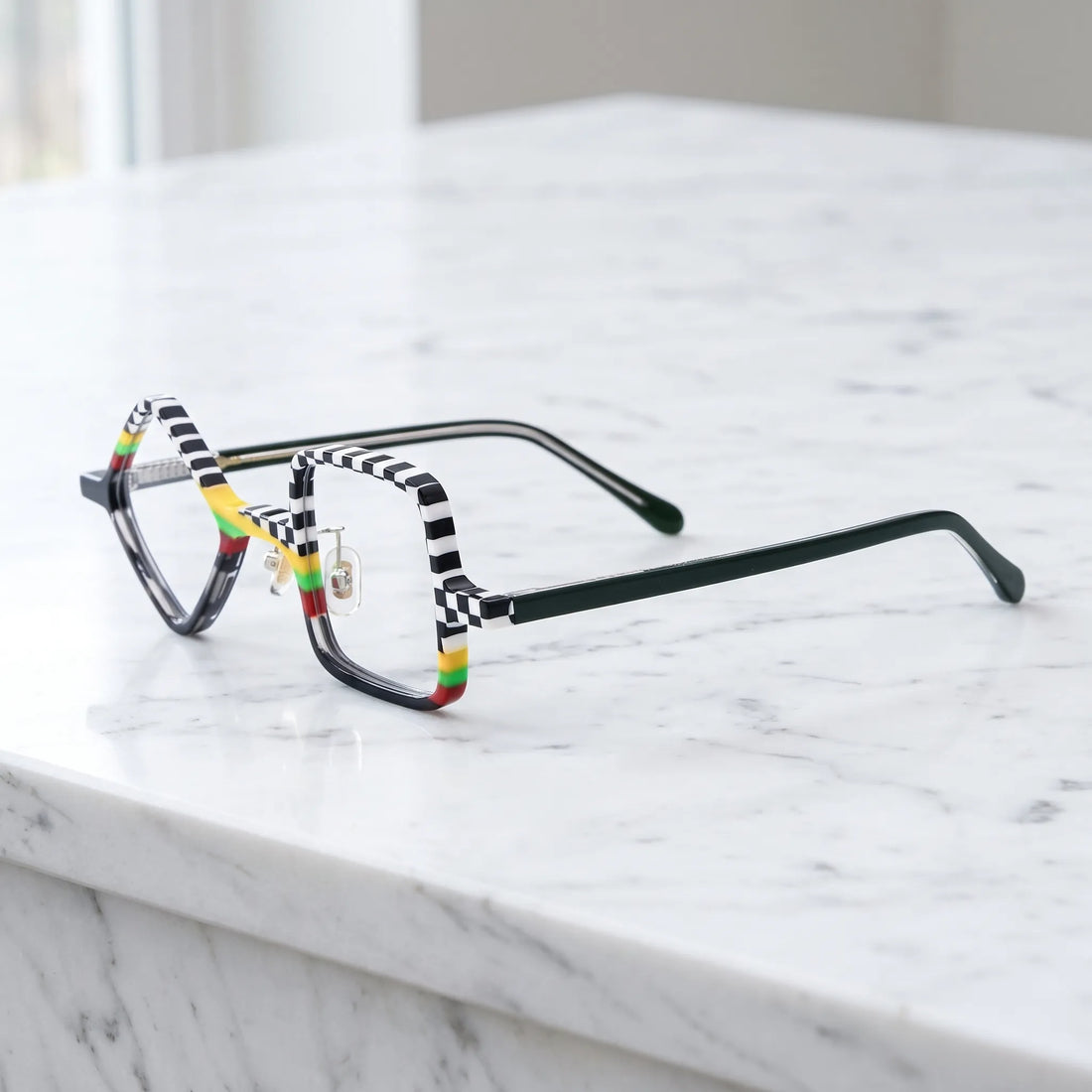 Barledear Checkerboard Spectrum asymmetric geometric acetate eyeglasses angled side view showing the mismatched frame shape, reinforced hinges, and slim deep green temples.