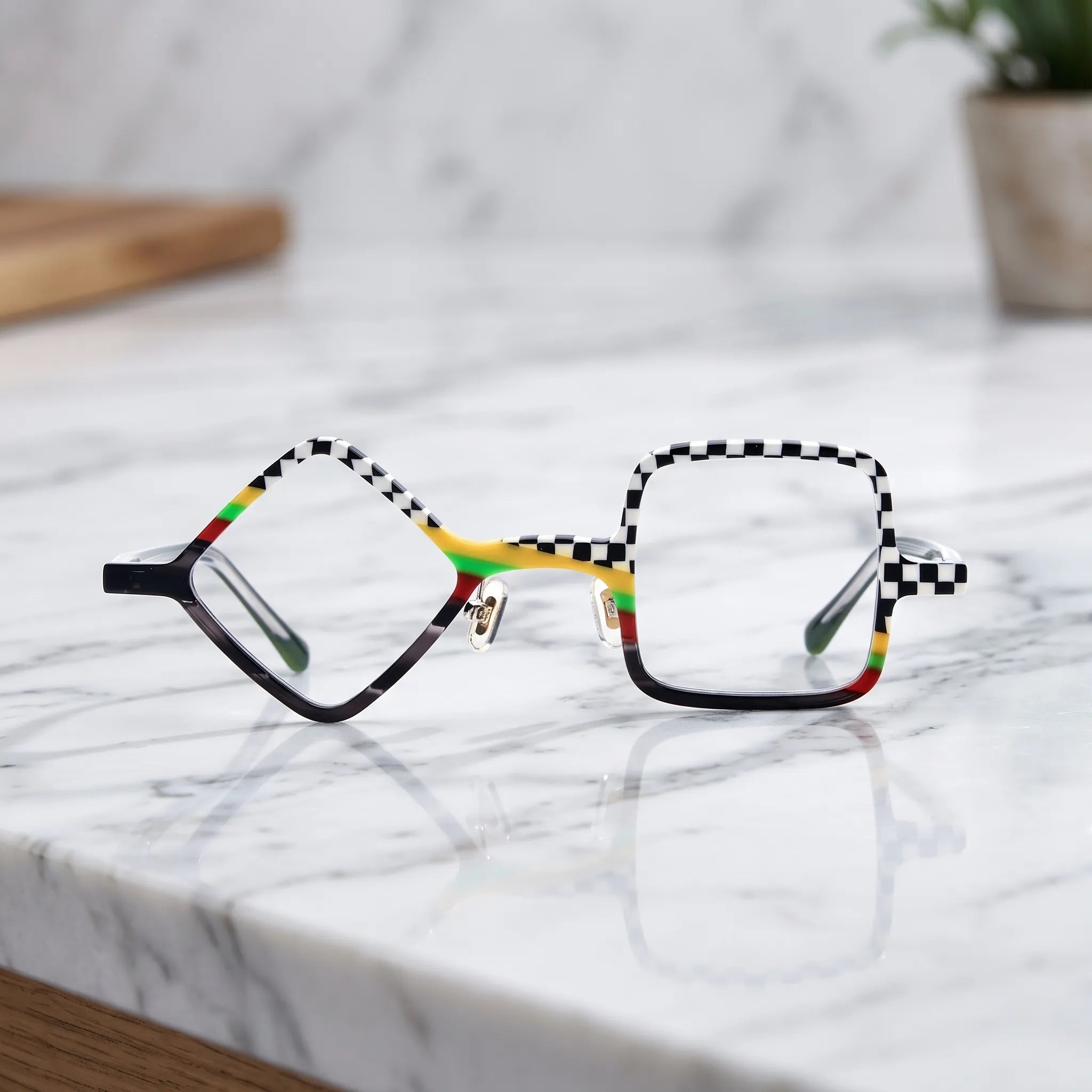 Barledear Checkerboard Spectrum asymmetric geometric acetate eyeglasses shown in a clean lifestyle front display with bold checkerboard and rainbow color blocking.