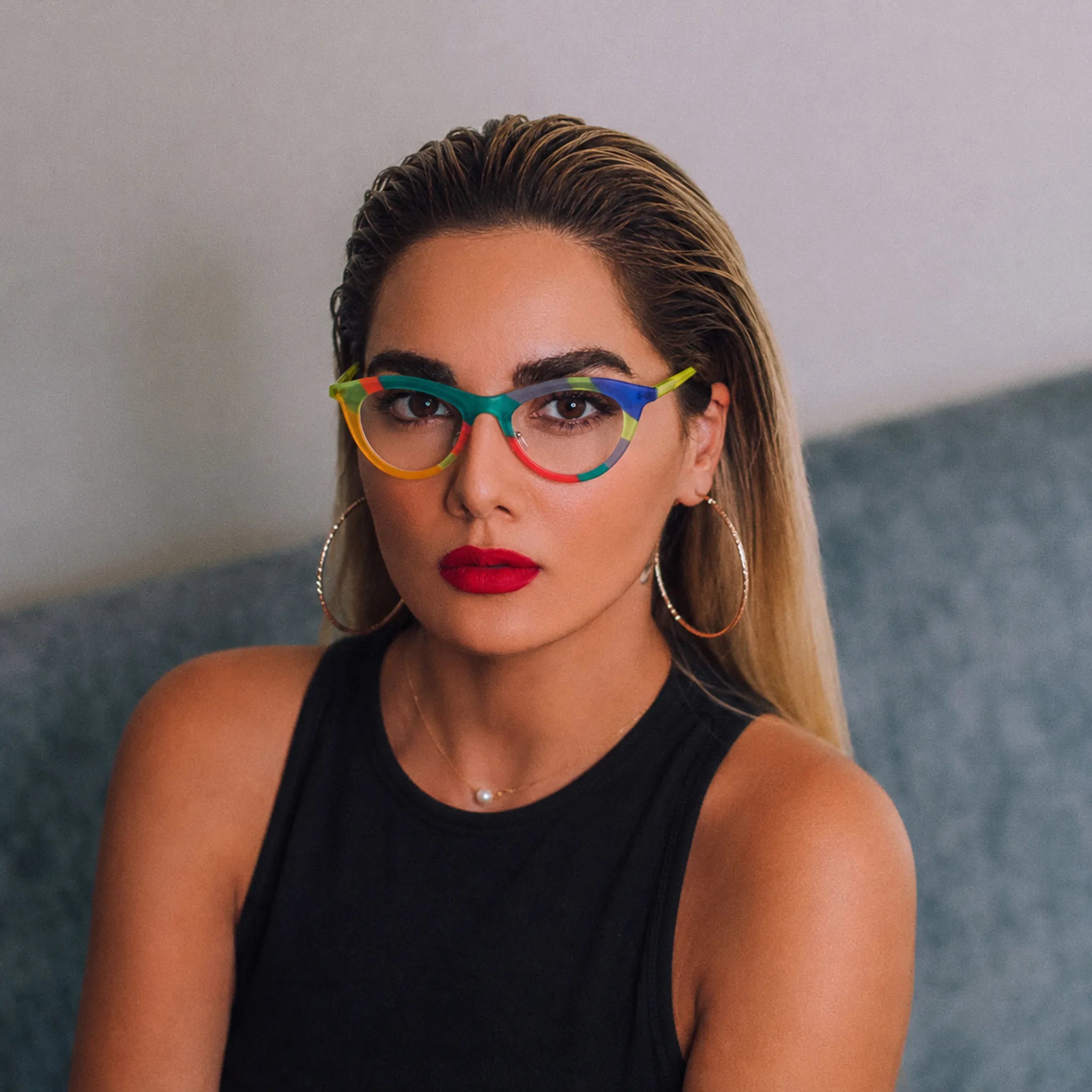 Model wearing Barledear Citrus Carnival colorful cat-eye acetate eyeglasses in a front-facing lifestyle portrait