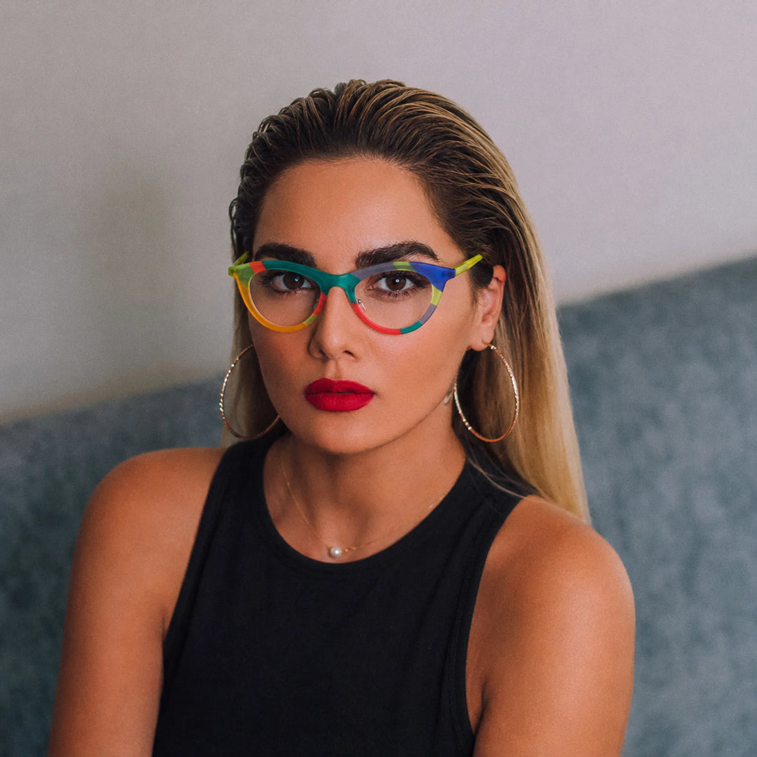 Model wearing Barledear Citrus Carnival colorful cat-eye acetate eyeglasses in a front-facing lifestyle portrait
