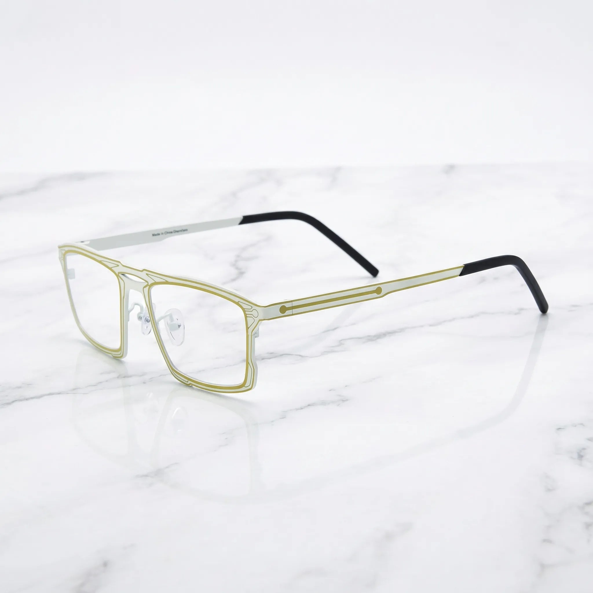 Barledear Citrus Ivory eyeglasses angled side view showing slim dual-tone temples, bridge detail, and adjustable nose pads