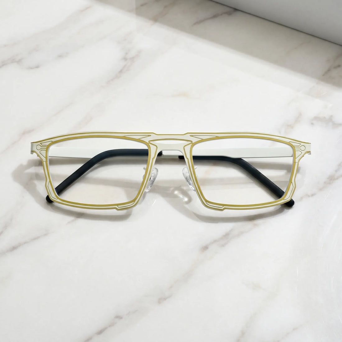 Barledear Citrus Ivory eyeglasses folded display showing slim titanium frame and temple design