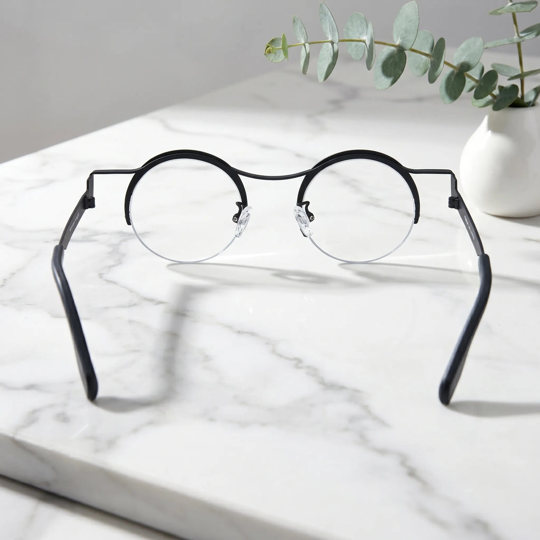 Barledear Classic Noir eyeglasses back view showing adjustable nose pads, slim temples, and comfortable pure titanium frame structure