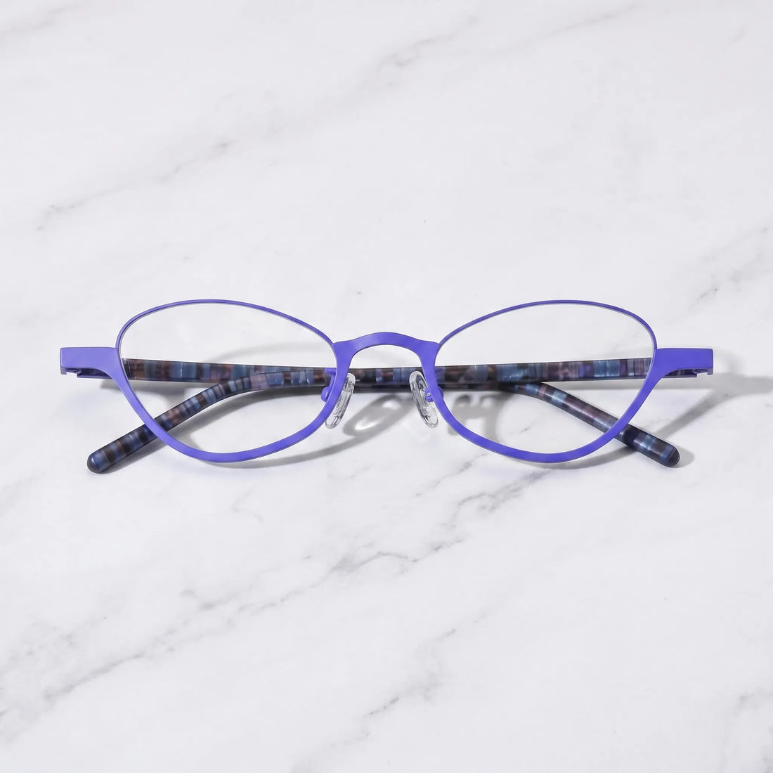 Barledear Cobalt Mosaic eyeglasses folded display showing dark patterned temples and lightweight titanium front