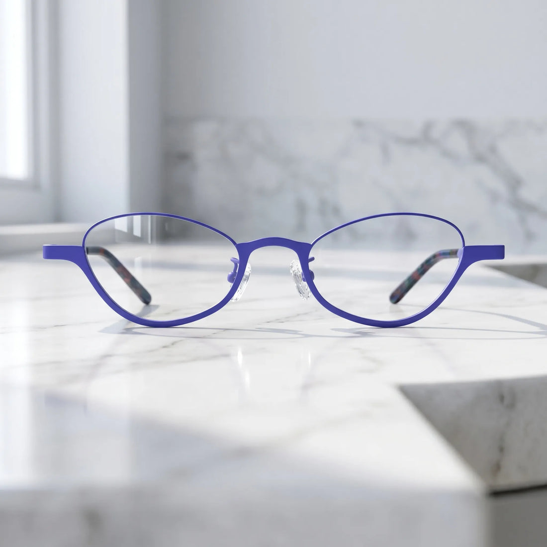 Barledear Cobalt Mosaic eyeglasses shown in a clean lifestyle front view with bold blue oval frame