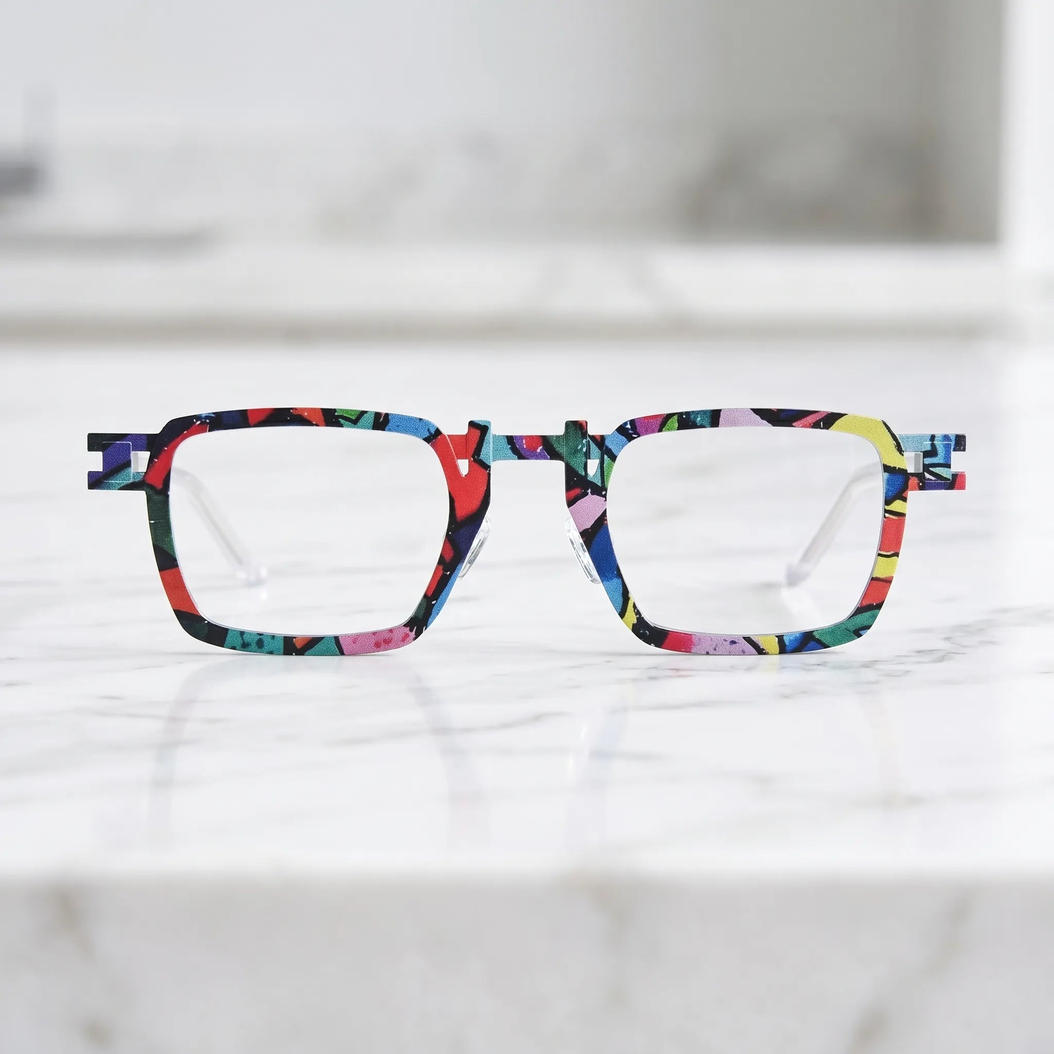 Barledear Confetti White Mosaic eyeglasses shown in a clean lifestyle front view with colorful graphic frame and white temple accents