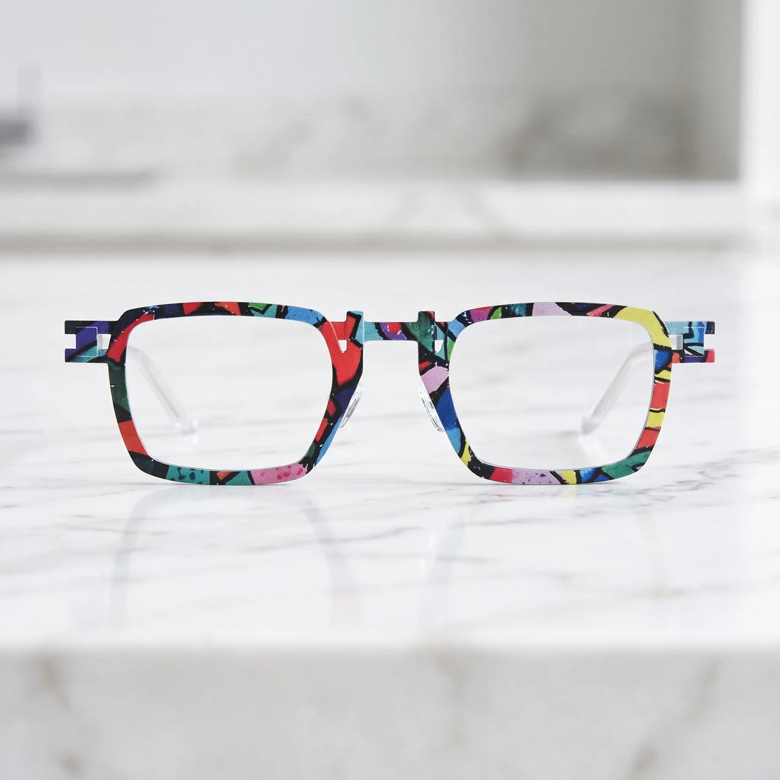 Barledear Confetti White Mosaic eyeglasses shown in a clean lifestyle front view with colorful graphic frame and white temple accents
